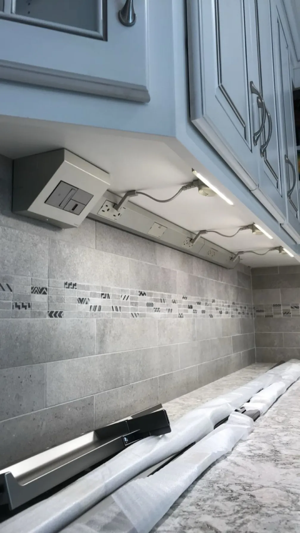 Kitchen under-cabinet lighting installation by Martel Electric